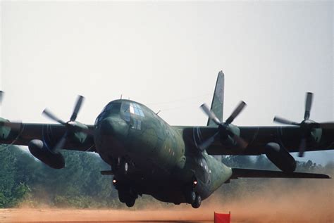A C 130 Hercules Aircraft Lands On An Unimproved Dirt Landing Strip At