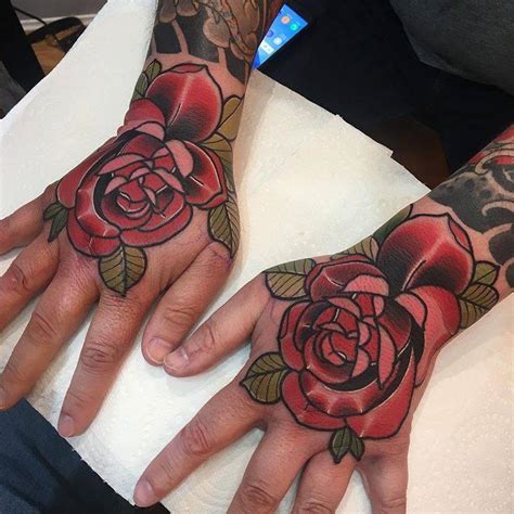 Matching Traditional Red Rose Tattoos On Both Hands