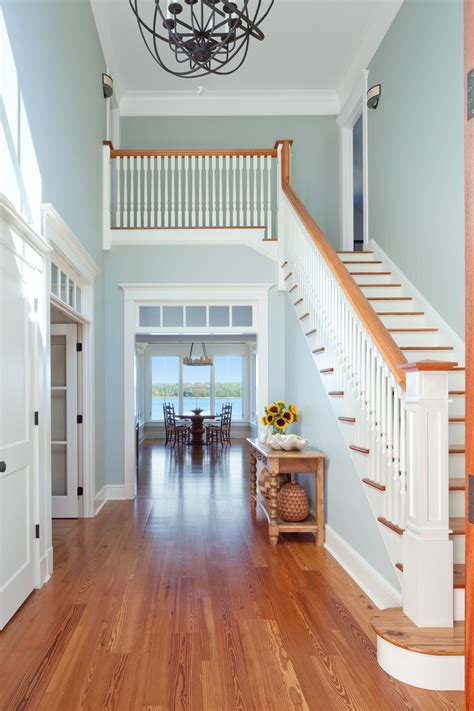 Light blue is a popular, versatile color. stair hall | Beach house interior, Paint colors for home ...