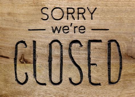 Sorry We Re Closed Sign On Door And Wooden Board Stock Image Image