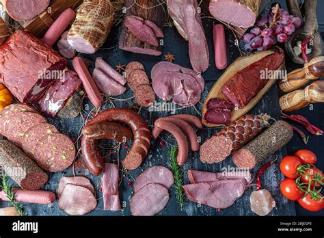 smoked meat products display meats cold cuts and sausages in a butcher s shop assortment of