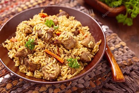 Pilaf With Meat And Vegetables Stock Photo By Odelinde