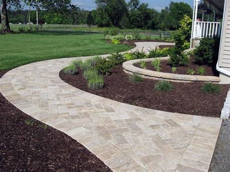 Pavers and natural stone offer a lot of flexibility when it comes to a front walk. Top 50 Best Paver Walkway Ideas - Exterior Hardscape Designs