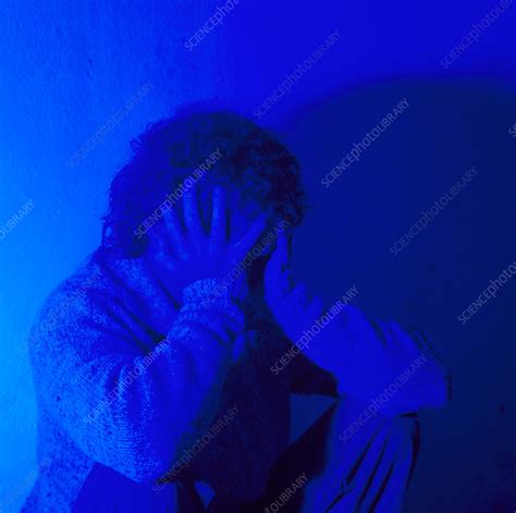 Depressed Man Holding His Head In His Hands Stock Image M2450350