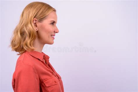 Closeup Profile View Of Happy Beautiful Blonde Businesswoman Smiling Stock Photo Image Of