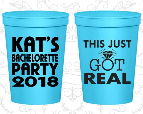 Two Blue Cups With The Words This Just Bachelor Party And Got Real Printed On Them