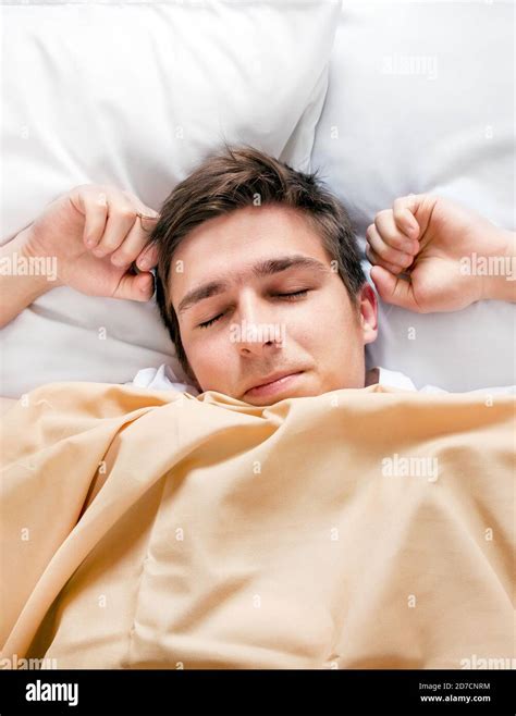 Young Man Sleep In The Bed At The Home Stock Photo Alamy