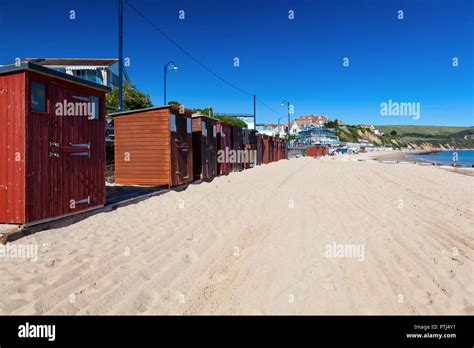 Beach Huts And Blue Sky At Swanage Dorset England Uk Europe Stock Photo