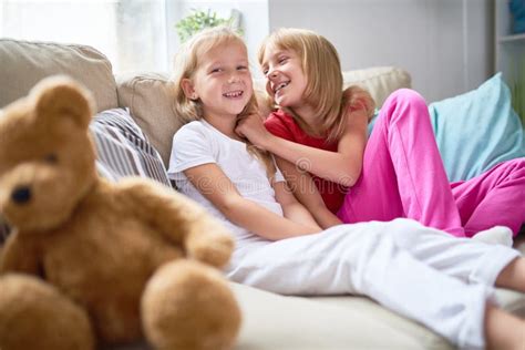 Two Sisters Having Fun Stock Image Image Of Living 100944529