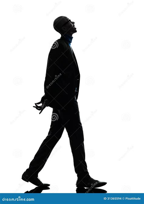 African Black Man Walking Looking Up Smiling Silhouette Stock Photo