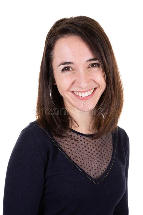 A Portrait Of Charming Brunette Woman In Smiling Broadly At Camera