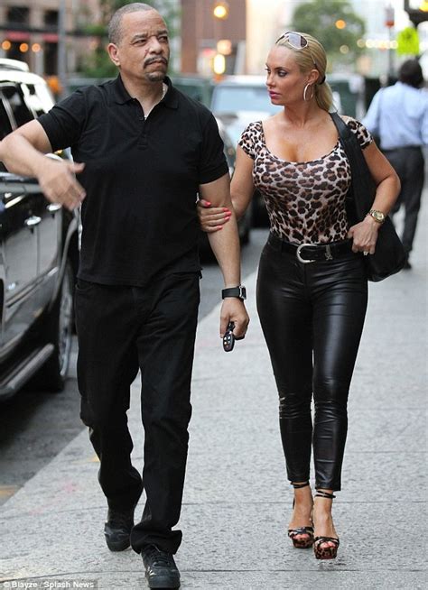 Ice T Looks Displeased Despite Wife Coco Flaunting Her Figure In Tight Top And Leather