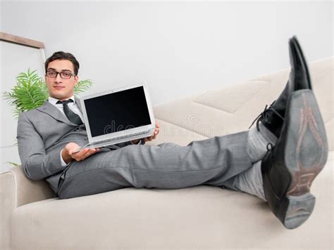 Young Businessman Lying On The Sofa Stock Image Image Of Happy Home