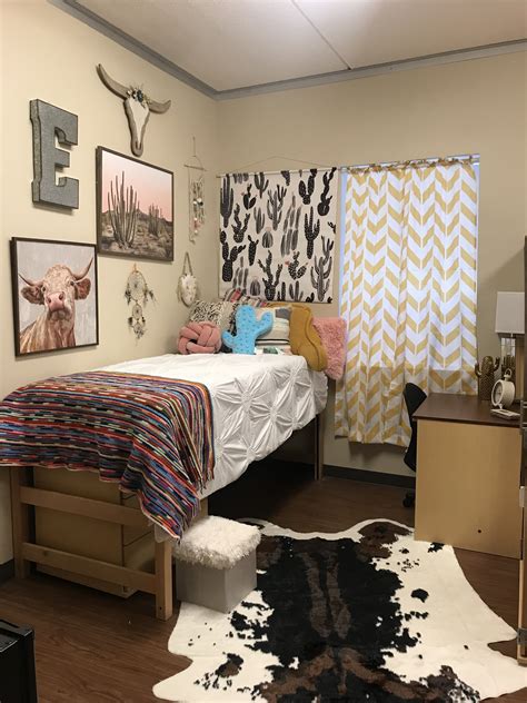 Desert hues combined with plenty of leather and wood lend authenticity to this style of decor. Dorm western cactus | Cool dorm rooms, Room ideas bedroom ...