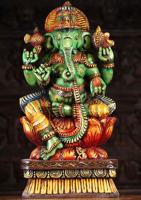 sold-wood-seated-ganesha-statue-holding-mango-24-94w9cr-hindu-gods