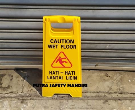 Jual Papan Peringatan Warna Kuning Caution Wet Floor Awas Lantai Licin
