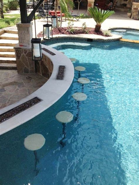 33 Impressive Swim Up Pool Bars Built For Entertaining Luxury Swimming