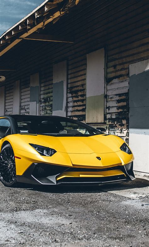 Download Wallpaper 1280x2120 Yellow Lamborghini Aventador Sports Car