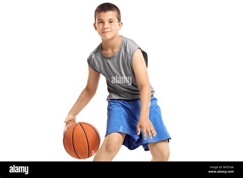 Boy Playing Basketball Isolated On White Background Stock Photo Alamy