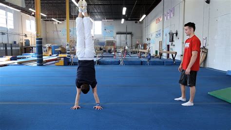 How To Do A Handstand Press Gymnastics Lessons Youtube