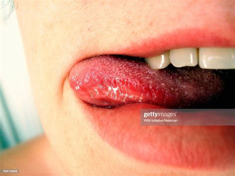 Closeup Of A Woman Licking Lips Photo Getty Images