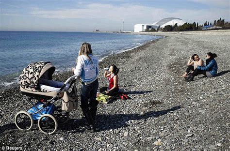 So Much For The Winter Olympics Sunkissed Beachgoers Strip Off In Sochi As Hot Weather Turns
