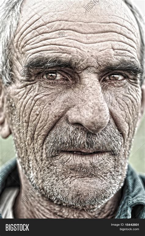 Closeup Portrait Of Old Man Wrinkled Elderly Skin Face Stock Photo