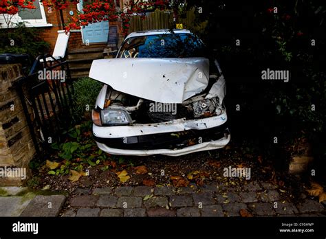 Crashed Car In Driveway Stock Photo Alamy