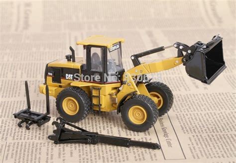 This reimagined line includes a dump truck, wheel loader, telehandler and cement mixer. Aliexpress.com : Buy Norscot 1/50 DieCast caterpillar Cat ...