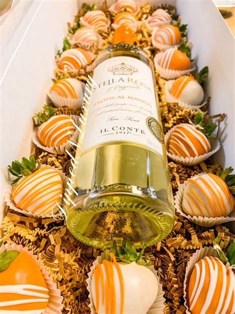 Filled with all sorts of goodies, this basket is the perfect gift. Wine & Berry Box in 2020 | Luxury event, Bouquet box, Wine box