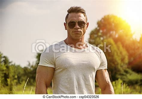 Bodybuilder Man Standing In Lawn Bodybuilder Man With Naked Muscular