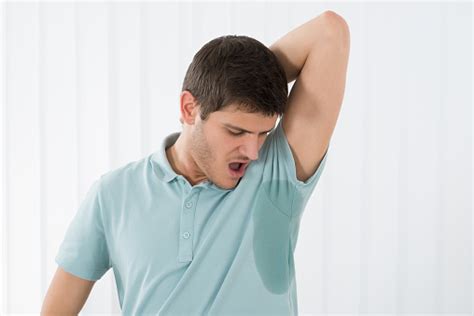 Man Sweating Very Badly Under Armpit Stock Photo Download Image Now