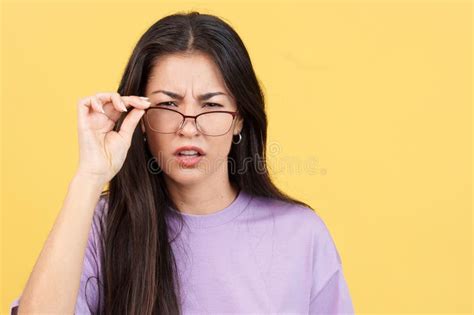 Woman Taking Off Her Glasses To See Facing The Camera Stock Image Image Of Optometrist