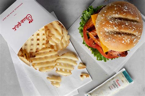 New Year New Flavors Chick Fil A Heats Up Menu With Grilled Spicy Chicken Deluxe Sandwich