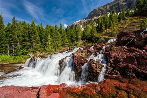 Waterfall In Glacier National Park Beautiful Waterfall With The