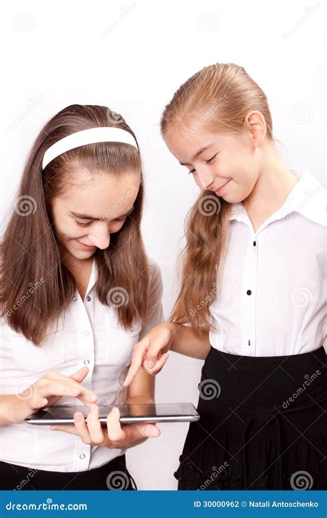 Two Girl With Ipad Like Gadget Stock Photo Image Of Display