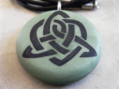 Celtic Symbol For Sisterhood Hand Carved On A Green Pearl