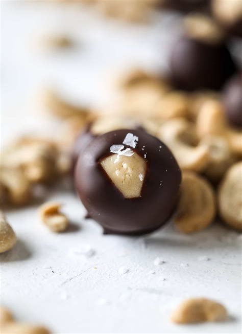 These classic buckeyes are given a makeover with the addition of a little bourbon, a dark chocolate coating, and a surprise toasted pecan inside for crunch! Buck Eye Truffle : Chubby Hubby Buckeye Truffles Recipe ...