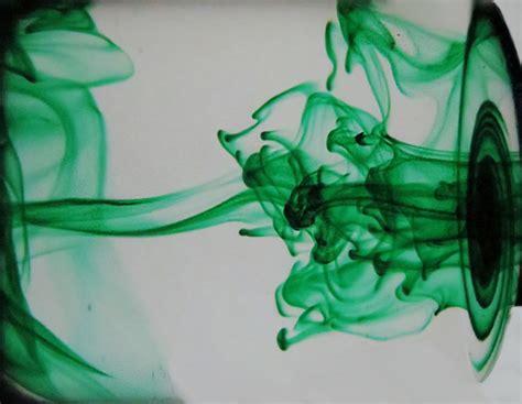 Food Dye Falling Through Gently Swirling Water Displays Complex