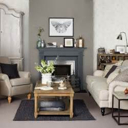If your living room is directly next to, or connected with your kitchen, green can be a great way to separate the two rooms. Grey and taupe living room | Living Spaces | Pinterest