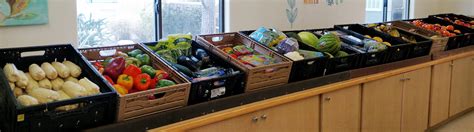 Food pantry volunteers work to stock shelves in food storage room. Saddleback Church: Ministries: Food Pantry