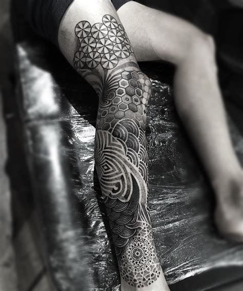 10 artists who create striking geometric tattoos spanning the body scene360