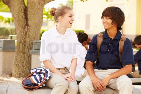 High School Students Wearing Uniforms On School Campus Stock Image