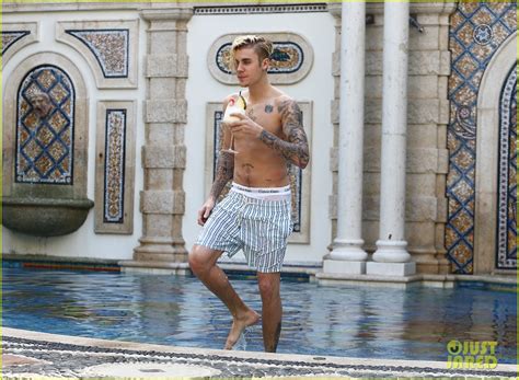 justin bieber goes shirtless for a swim at the versace mansion photo 3528497 justin bieber