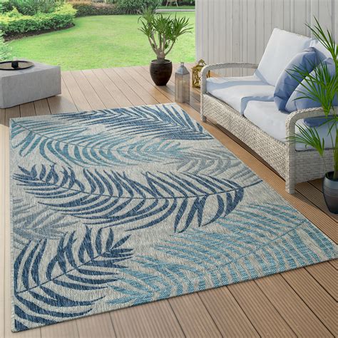 Care fair nicht nur die qualitatsstandards unserer teppiche liegen uns am herzen. In- und Outdoor-Teppich Palmen Design Blau | Teppich.de