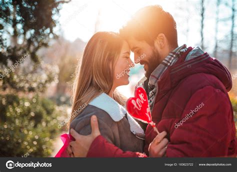 Stylish Couple Almost Kissing Outdoors Stock Photo By ©nebojsakigmail