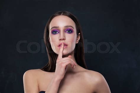 sensual woman finger on lips silence stock image colourbox
