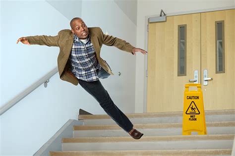 Businessman Falling On Stairwell Stock Photo Download Image Now Istock