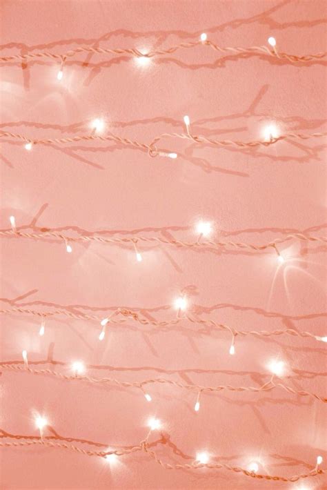 The background of this screen can be a single colour, multiple colours, or some other graphical representations. Coral Pink Christmas Lights | Wallpaper iphone christmas ...