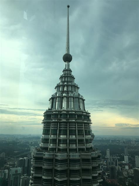 Tower Building Landmark Under Cloudy Sky · Free Stock Photo